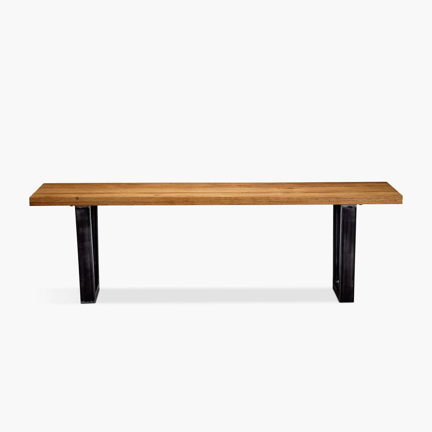 A rectangular wooden bench with a flat seat and two black metal legs at each end, set against a plain white background—ideal for Trinidad Event Furniture or Trinidad Wedding Hire requirements. - Perched Event Rentals, Trinidad