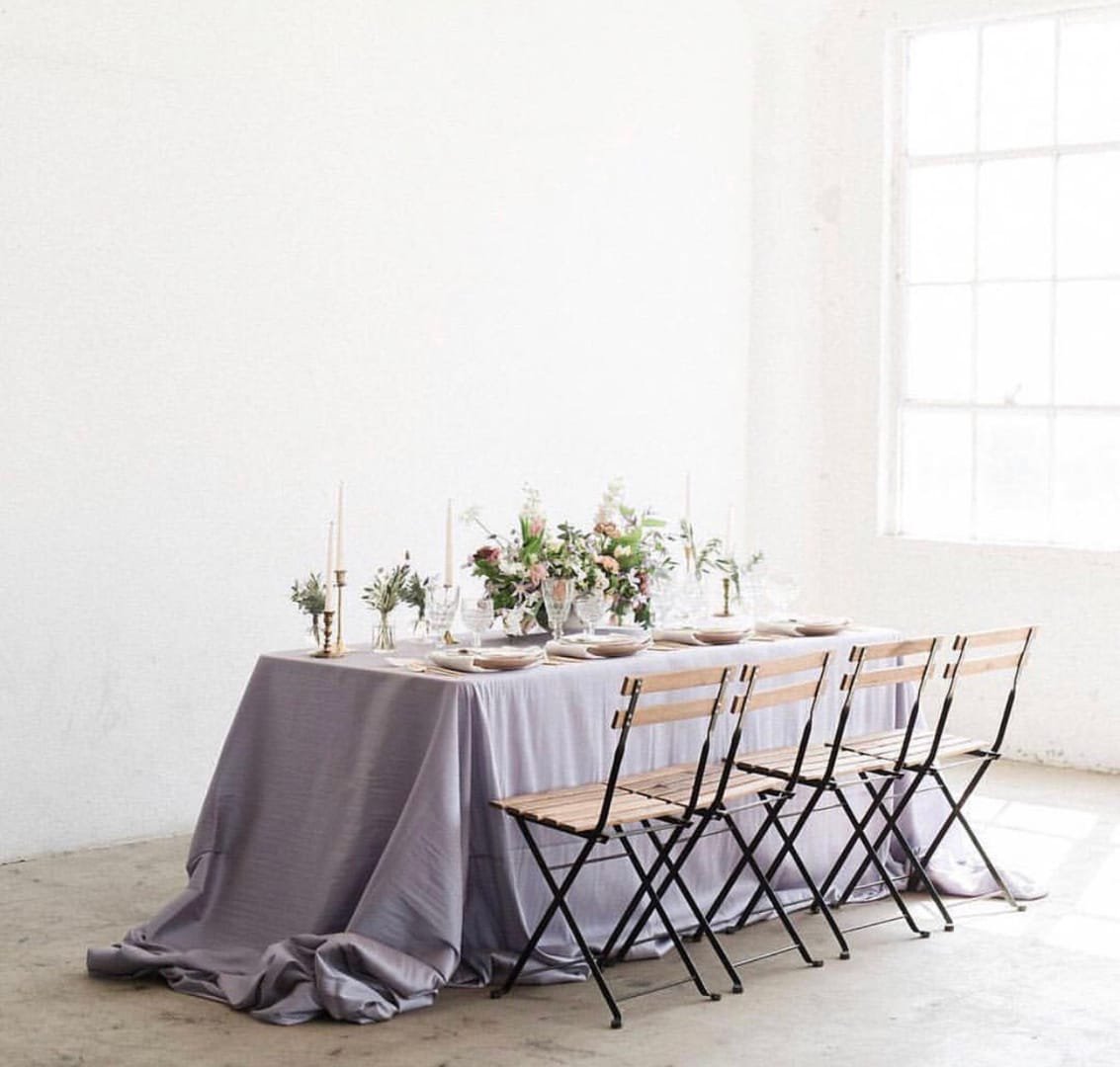 French Bistro Chair: An outdoor chair made of wood and stained steel, with the natural look of the wood left on show.
