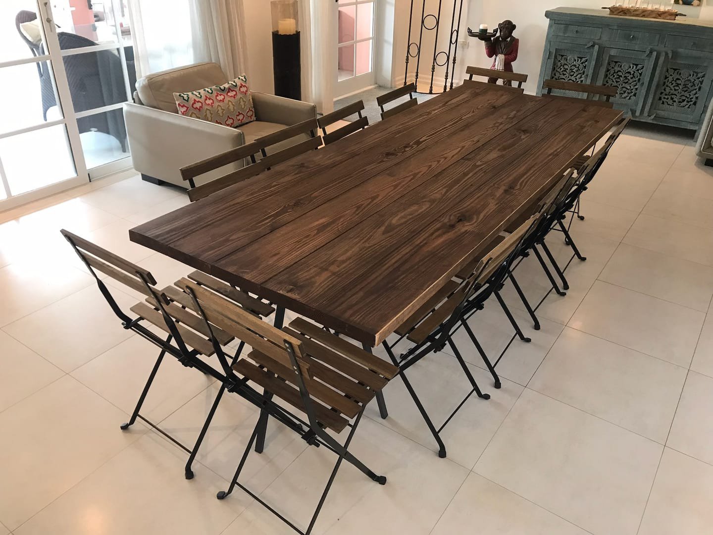 French Bistro Chair: An outdoor chair made of wood and stained steel, with the natural look of the wood left on show.