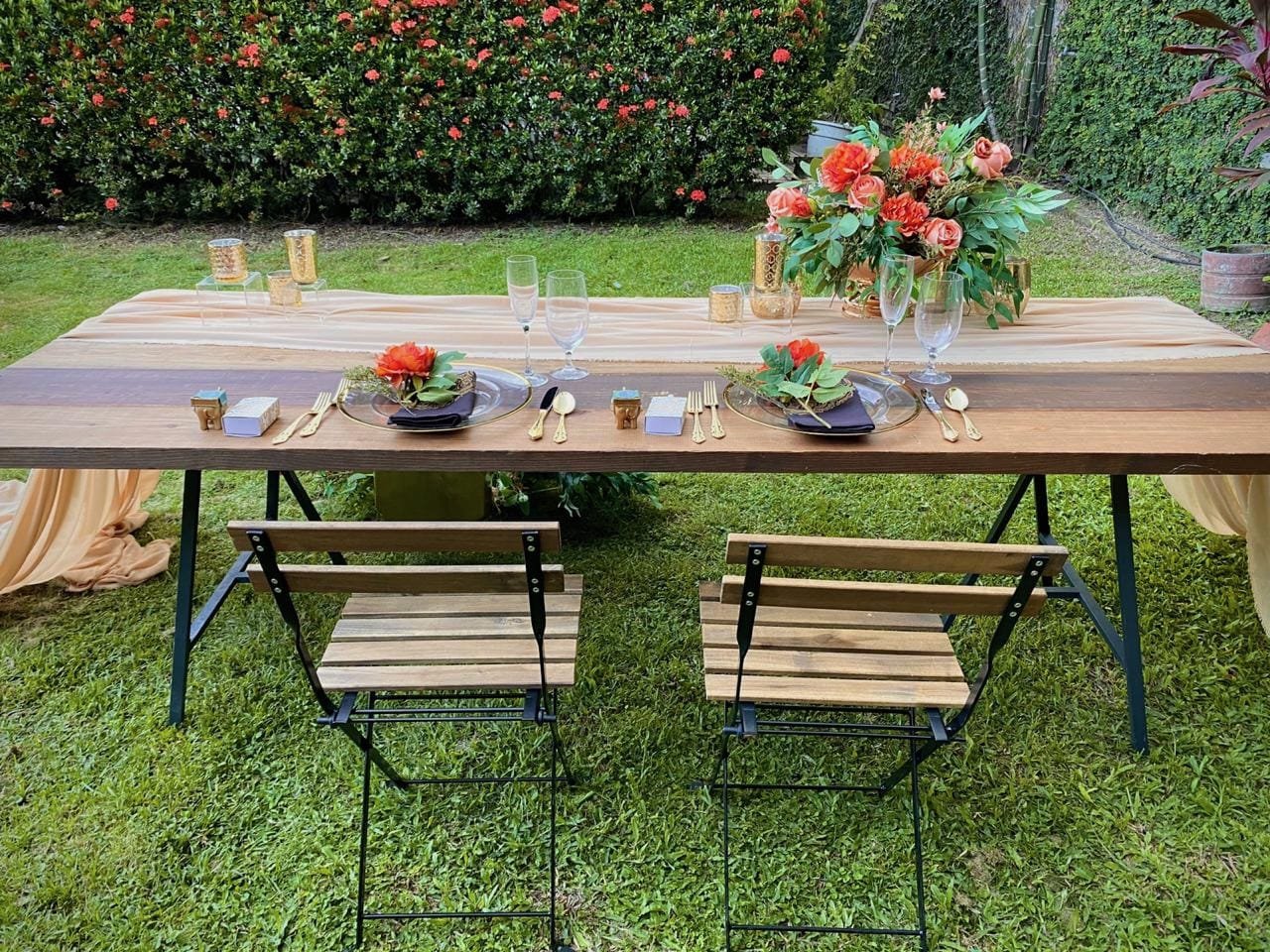 French Bistro Chair: An outdoor chair made of wood and stained steel, with the natural look of the wood left on show.