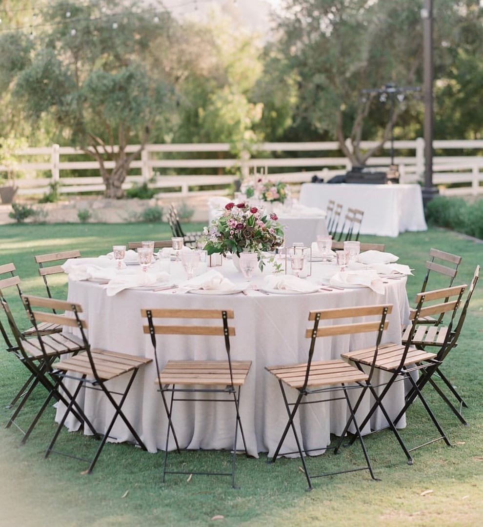 French Bistro Chair: An outdoor chair made of wood and stained steel, with the natural look of the wood left on show.
