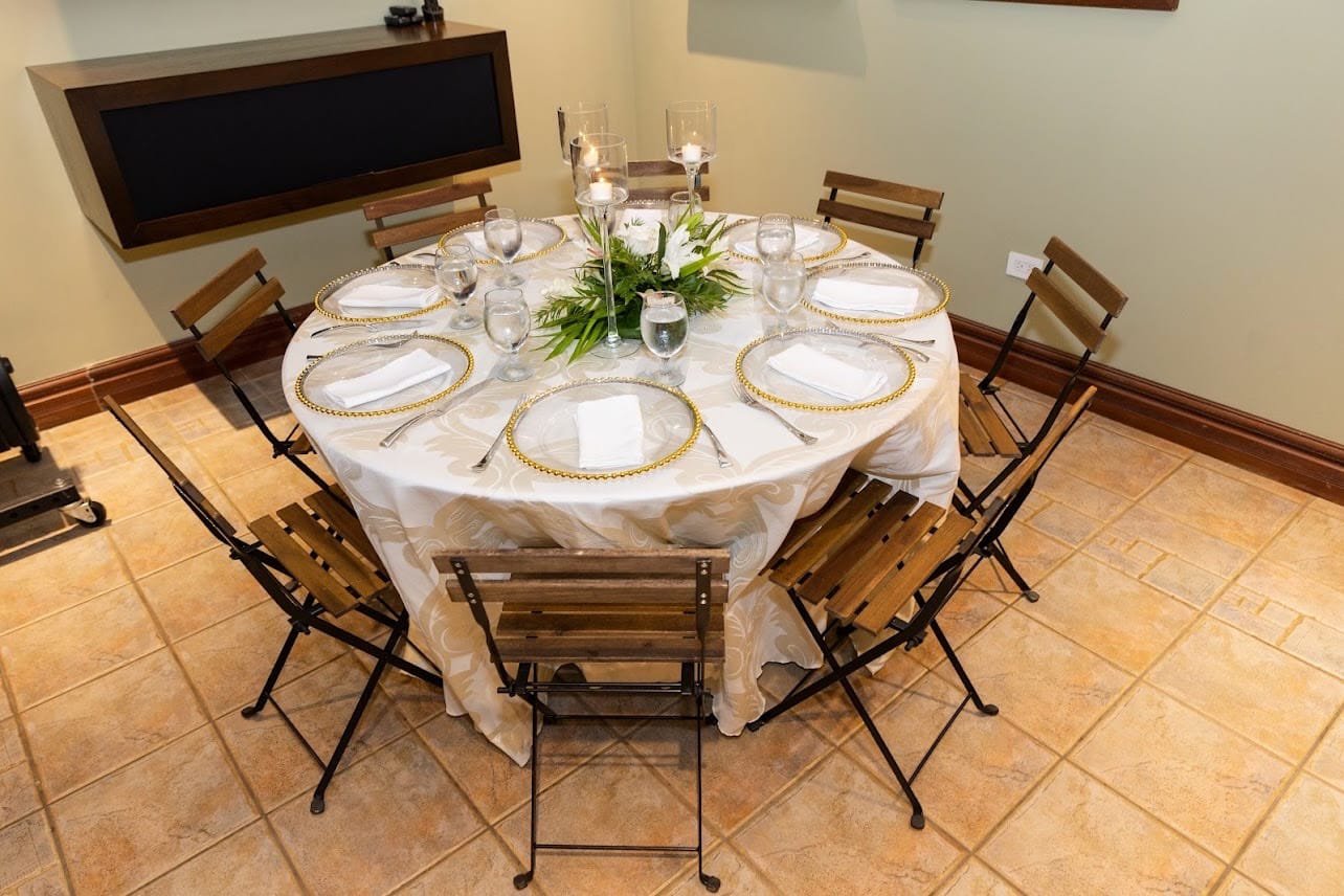 French Bistro Chair: An outdoor chair made of wood and stained steel, with the natural look of the wood left on show.