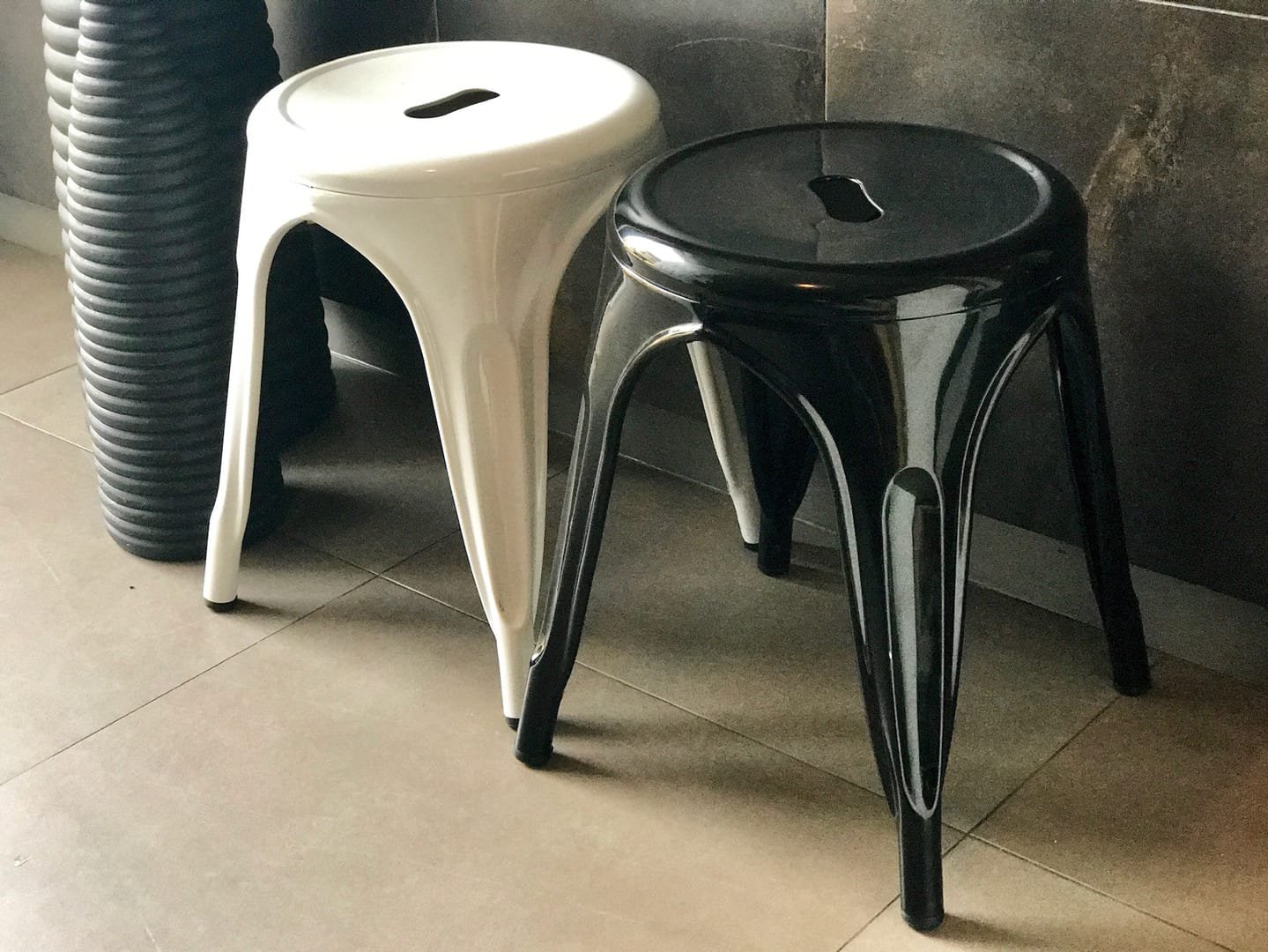Industrial Stool: The Industrial Stool is a short metal stool from the Tolix line, available in black and white.